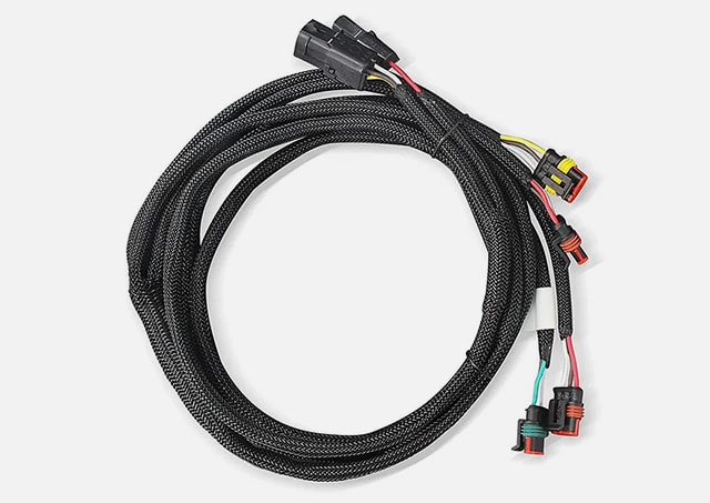 Braided industrial automation harness with sealed connectors
